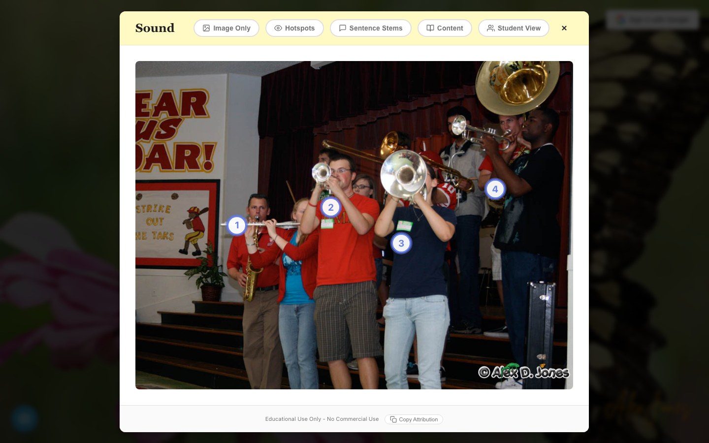 The photo viewer showing the Sound photograph of student musicians playing brass instruments, with four numbered hotspot markers placed on the instruments and a toolbar offering Image Only, Hotspots, Sentence Stems, Content, and Student View